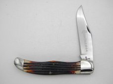 Queen Cutlery #44 Folding Hunter with “burnt orange” imitation Winterbottom bone: 5 1/4” closed,