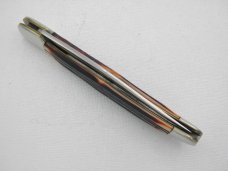 Queen Cutlery #44 Folding Hunter with “burnt orange” imitation Winterbottom bone:  5 1/4” closed, 