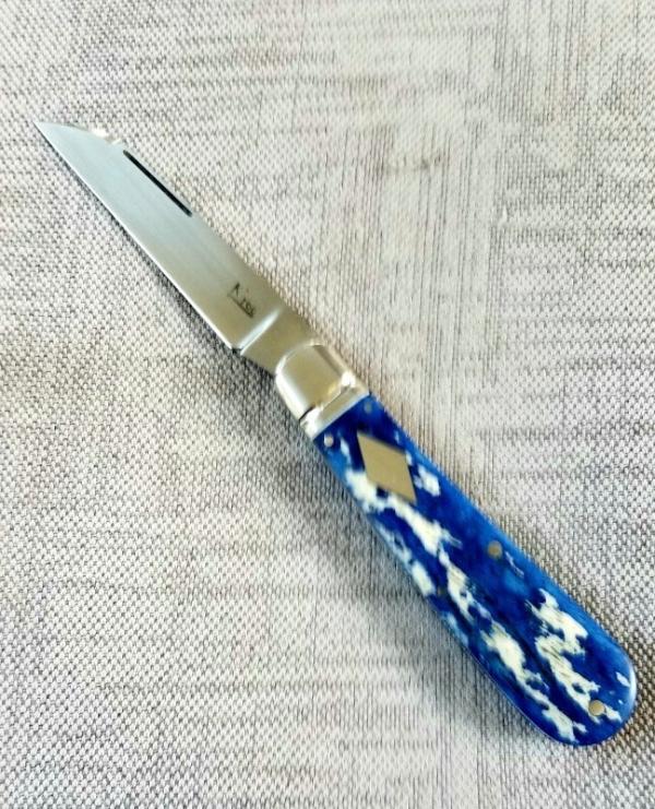 Kroo Blue Kudu Bone Lambsfoot,4" closed, Rwl34,white liners & spacers diamond shield.fileworked Kroo Blue Kudu Bone Lambsfoot,4" closed, Rwl34,white liners & spacers diamond shield.fileworked