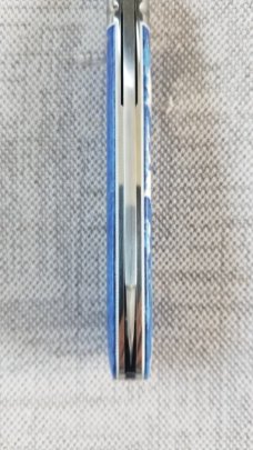 Kroo Blue Kudu Bone Lambsfoot,4" closed, Rwl34,white liners & spacers diamond shield.fileworked 