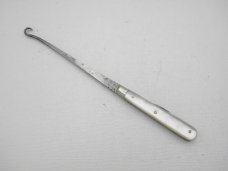 Howard Cutlery Company circa 1895 button hook with small blade 5 38 overall closed