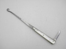 Howard Cutlery Company, circa 1895, button hook with small blade, 5 3/8” overall closed