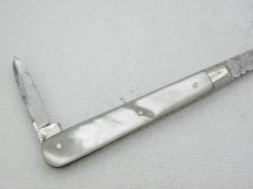 Howard Cutlery Company, circa 1895, button hook with small blade, 5 3/8” overall closed