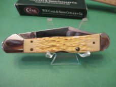 Case XX 2007 Burnt Oatmeal Bone Handle Arrowhead Shield Copperlock Pattern # 61549L SS