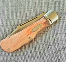 MDK custom Lanny, giraffe bone scales. Fluted bolsters and bowtie Shield..coa and pouch 