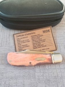 MDK custom Lanny, giraffe bone scales. Fluted bolsters and bowtie Shield..coa and pouch 