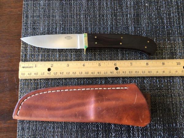 C.R.Sigman model “working hunter” in a jim layton pouch style sheath 