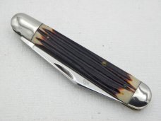 Queen Cutlery Co. #28 English Jack in Burnt Orange Imitation Winterbottom Bone: 4 1/2” closed; 1961