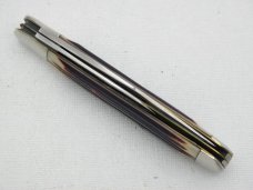 Queen Cutlery Co. #28 English Jack in Burnt Orange Imitation Winterbottom Bone: 4 1/2” closed; 1961