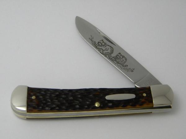 Western USA S-693 D Jigged Delrin Linerlock 1 Blade Trapper Knife with Raccoon Etch c.1980 -