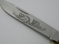 Western USA S-693 D Jigged Delrin Linerlock 1 Blade Trapper Knife with Raccoon Etch c.1980 -