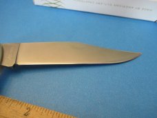 Case XX 1977 White Delrin Texas Special Folding Hunter Pattern # 4165 SSP