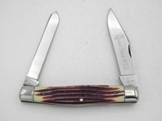 Queen Cutlery #52 Moose in Burnt Orange imitation Winterbottom bone: 4 3/8” closed, circa 1960
