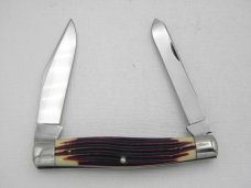 Queen Cutlery #52 Moose in Burnt Orange imitation Winterbottom bone:  4 3/8” closed, circa 1960