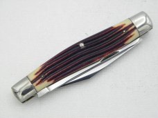 Queen Cutlery #52 Moose in Burnt Orange imitation Winterbottom bone:  4 3/8” closed, circa 1960