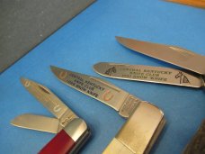 3 Knives one money  2 are Parker Edwards & one Bear 