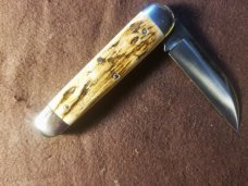 NORTHWOODS FREMONT JACK MAMMOTH IVORY HANDLES W COIN AND SLIP NIP