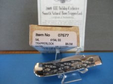 Case XX 2009 CCC Exclusive Smooth Natural Bone Trapperlock Pattern # 6154L SS