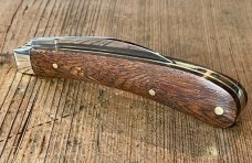 A Wright & Son "Ettrick" Carving knife Rosewood Scales and Curved Wharncliffe Blade