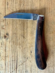 A Wright & Son "Ettrick" Carving Knife with Ebony Scales and Curved Wharncliffe Blade