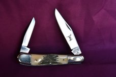 this is a nice 4-inch 2 blade genuine stag horn handle 79-83 