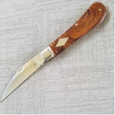 Kroo Bose Swayback in Desert ironwood and Rwl34..4" closed..red liners and spacersfilework..coa/slip
