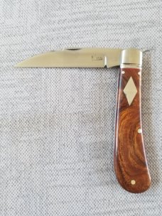 Kroo Bose Swayback in Desert ironwood and Rwl34..4" closed..red liners and spacersfilework..coa/slip
