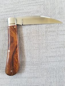 Kroo Bose Swayback in Desert ironwood and Rwl34..4" closed..red liners and spacersfilework..coa/slip