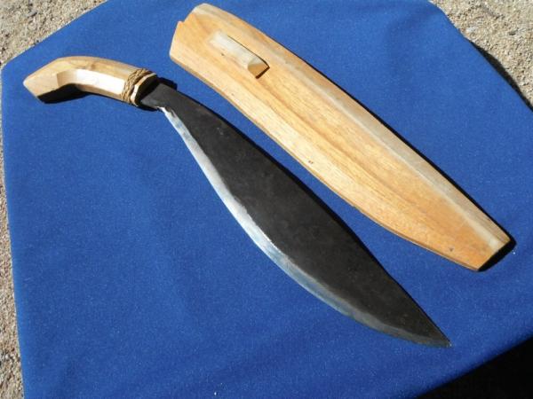 Hand forged Bolo knife /sword from the Philippines. The blade is SHARP! Hand forged Bolo knife /sword from the Philippines. The blade is SHARP!