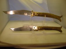 Two Rampur India style automatics embossed handles . Unused condition. 12 inch and 8 3/4 inch open