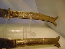 Two Rampur India  style automatics embossed handles .  Unused condition. 12 inch and 8 3/4 inch open