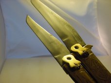 Two Rampur India  style automatics embossed handles .  Unused condition. 12 inch and 8 3/4 inch open