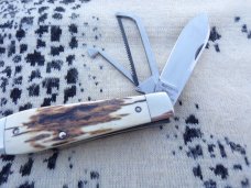 NAPANOCH KNIFE COMPANY MAMMOTH IVORY DIXIE COCK 1095 CARBON 100 WERE MADE