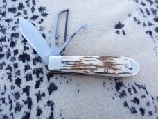 NAPANOCH KNIFE COMPANY MAMMOTH IVORY DIXIE COCK 1095 CARBON 100 WERE MADE