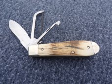 NAPANOCH KNIFE COMPANY MAMMOTH IVORY DIXIE COCK 1095 CARBON 100 WERE MADE