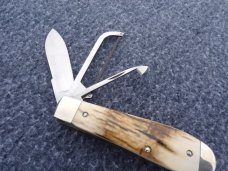 NAPANOCH KNIFE COMPANY MAMMOTH IVORY DIXIE COCK 1095 CARBON 100 WERE MADE