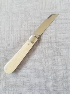 Riaan Ras  Swayback Native..Giraffe Bone..N690..red G10 accents..4" clsd..long pull..coa...SALE