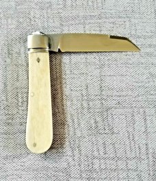 Riaan Ras  Swayback Native..Giraffe Bone..N690..red G10 accents..4" clsd..long pull..coa...SALE