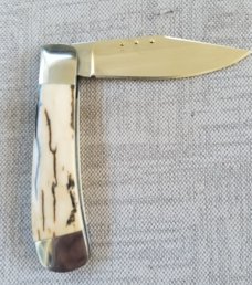 Steve Vanderkolff Mammoth Clip 4"cld..Smooth White Crackle.CPM-154. integral bolsters & caps..SALE