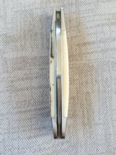 Steve Vanderkolff Mammoth Clip 4"cld..Smooth White Crackle.CPM-154. integral bolsters & caps..SALE