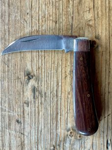 A Wright & Son "Peach" Swayback knife with Rosewood Scales and Curves Wharncliffe Blade