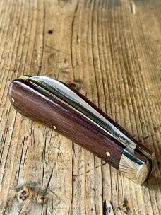 A Wright & Son "Peach" Swayback Knife with Ebony Scales and Curved Wharncliffe Blade