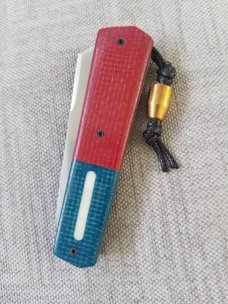 Vincenzo Balistreri 2nd Amendment White Wolf,4" .440C..red/white/blue.bullet shield and bead. 