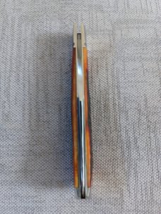 Tobin Hill Amber cured Sambar Stag..4.5" closed..Cpm154..fluted bolsters..end caps and filework 