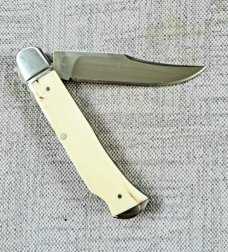 D.R.,David, Davis Mammoth ivory Slimline Lockback,little over 4.".52100..fluted...vine filework 