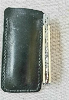 D.R.,David, Davis Mammoth ivory Slimline Lockback,little over 4.".52100..fluted...vine filework 