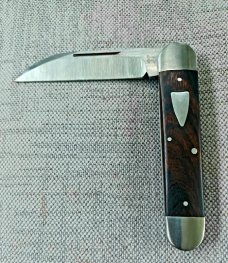 John Travers out of the UK, "Fremont Jack"..Saber ground Sandvik 14C28N with Desert Ironwood, slip