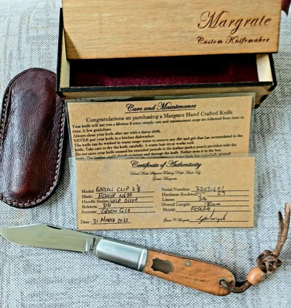 Margrate Clip Barlow..Wild Olive Root Burl..N690.3.75" clsd.liners..spacers..Fluted..coa..slip..box. Margrate Clip Barlow..Wild Olive Root Burl..N690.3.75" clsd.liners..spacers..Fluted..coa..slip..box.