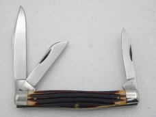 Queen Cutlery #16 Stockman, circa 1960, 3 3/8” closed, burnt orange imitation Winterbottom bone 