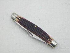 Queen Cutlery #16 Stockman, circa 1960, 3 3/8” closed, burnt orange imitation Winterbottom bone 